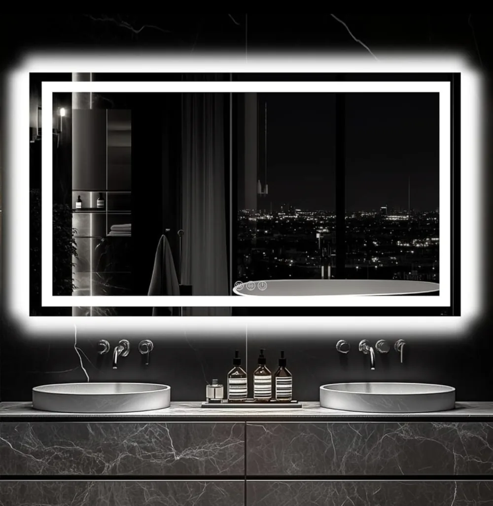 Backlit LED bathroom mirror above a double vanity with vessel sinks