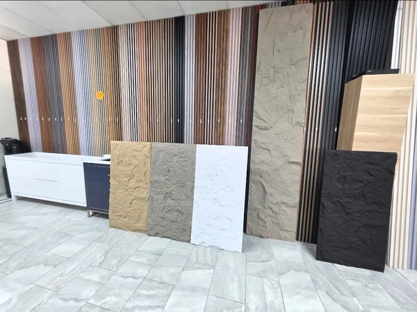 Stone veneer panel samples in beige, white and charcoal