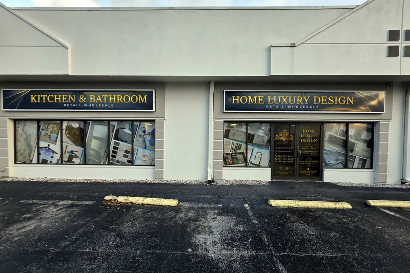 Home Luxury Design storefront with the Kitchen & Bathroom and Home Luxury Design signs